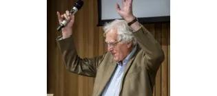 Photo of Alastair Salvesen waving hands in air