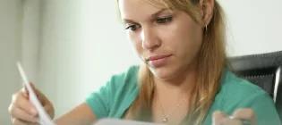 Student reading through documents
