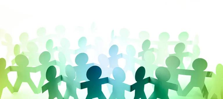drawing of several cut-out figures holding hands
