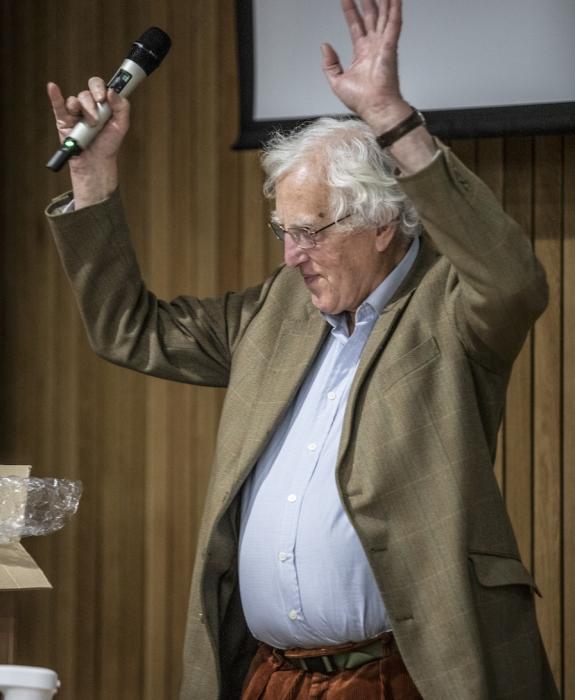 photo of Alastair Salvesen waving hands in air